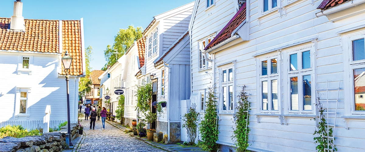White houses on a street in Stavanger, Norway